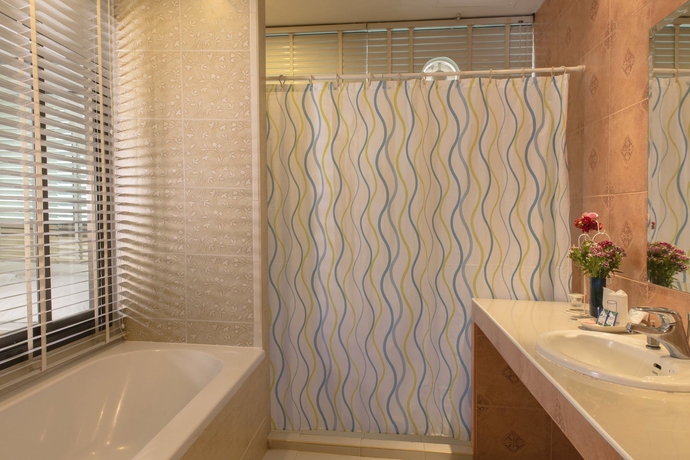 Imagen de la habitación del Hotel The Best Bangkok House. Foto 15