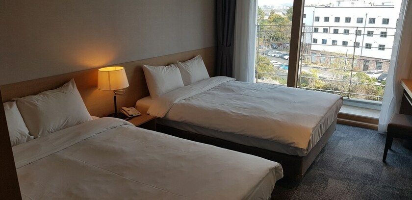 Imagen de la habitación del Hotel The Best Jeju Seongsan. Foto 15