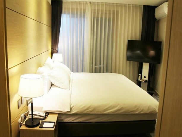 Imagen de la habitación del Hotel The Best Jeju Seongsan. Foto 18