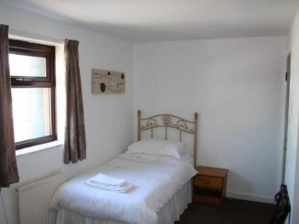 Imagen de la habitación del Hotel The Beverley Inn. Foto 9