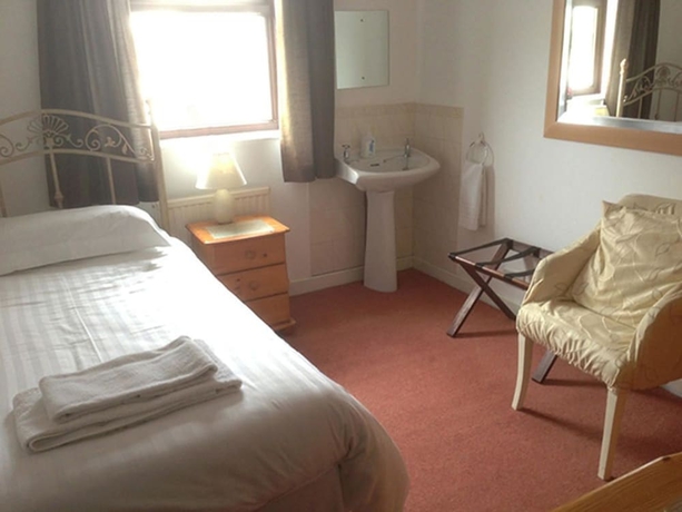 Imagen de la habitación del Hotel The Beverley Inn. Foto 10