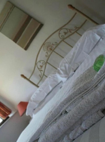 Imagen de la habitación del Hotel The Beverley Inn. Foto 13