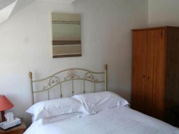 Imagen de la habitación del Hotel The Beverley Inn. Foto 14