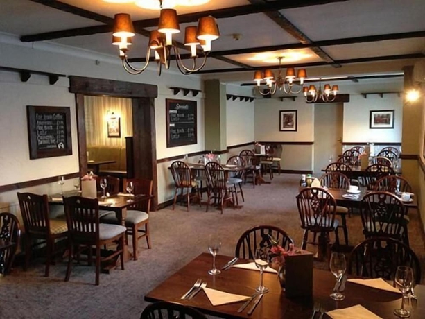 Imagen del bar/restaurante del Hotel The Beverley Inn. Foto 2