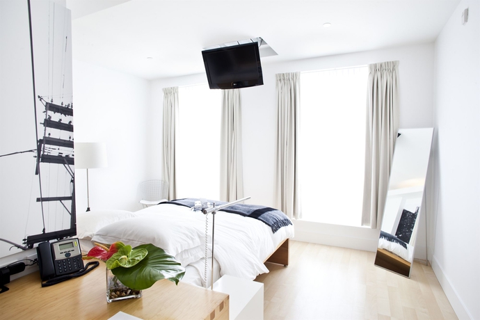 Imagen de la habitación del Hotel The Beverley, Toronto. Foto 7