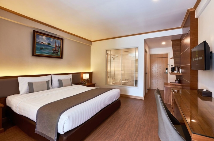 Imagen de la habitación del Hotel The Beverly Pattaya. Foto 2
