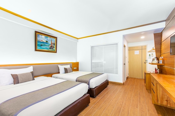 Imagen de la habitación del Hotel The Beverly Pattaya. Foto 3