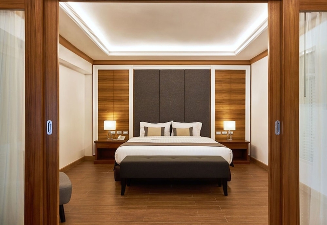 Imagen de la habitación del Hotel The Beverly Pattaya. Foto 4