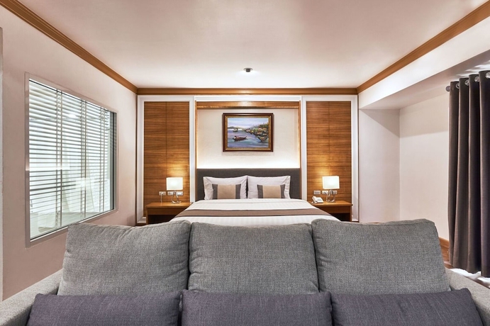 Imagen de la habitación del Hotel The Beverly Pattaya. Foto 9