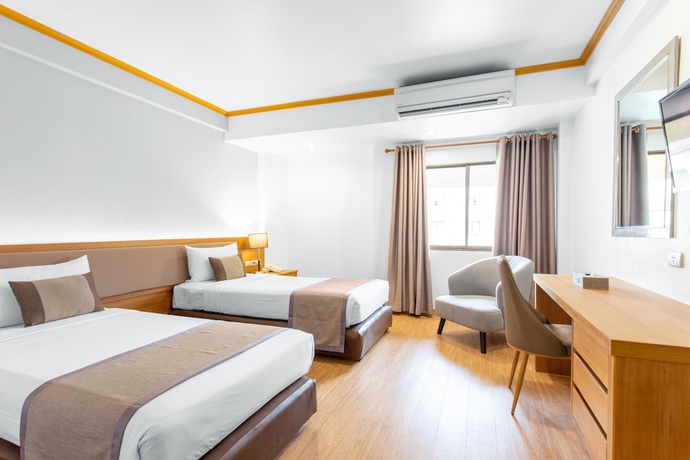 Imagen de la habitación del Hotel The Beverly Pattaya. Foto 11