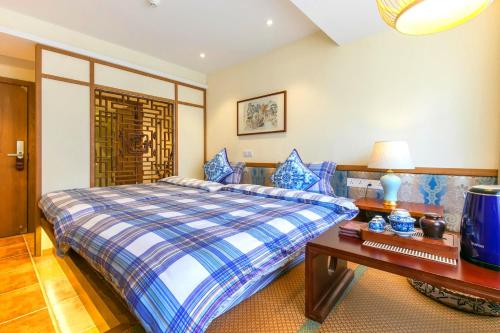 Imagen de la habitación del Hotel The Beyond Villa Guilin. Foto 6