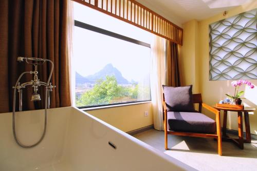 Imagen de la habitación del Hotel The Beyond Villa Guilin. Foto 7