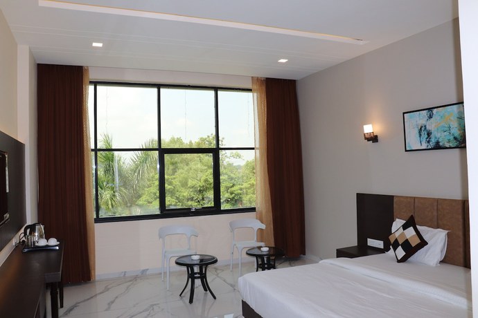 Imagen de la habitación del Hotel The Bhagwati Resort. Foto 4