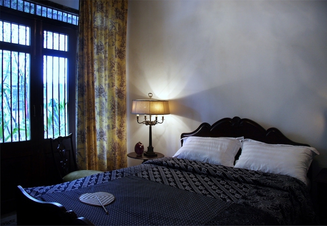 Imagen de la habitación del Hotel The Bhuthorn Bed and Breakfast. Foto 7