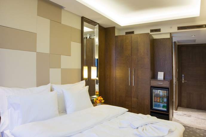 Imagen de la habitación del Hotel The Biancho Pera. Foto 4