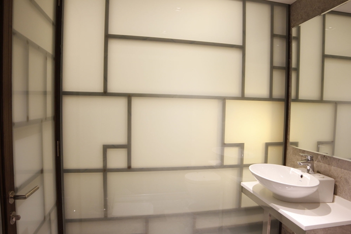 Imagen de la habitación del Hotel The Biancho Pera. Foto 7