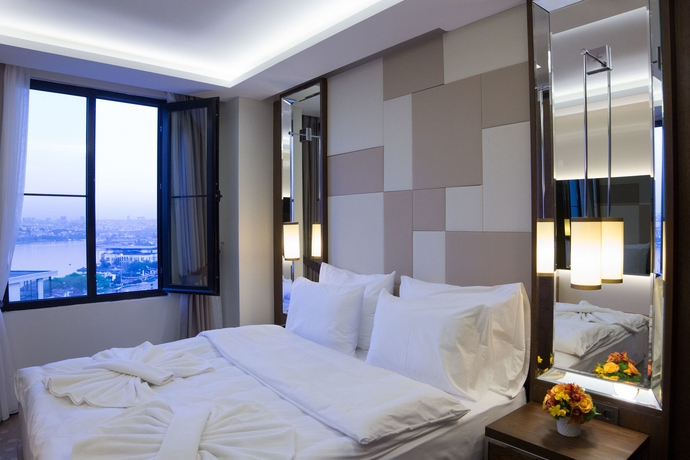 Imagen de la habitación del Hotel The Biancho Pera. Foto 8