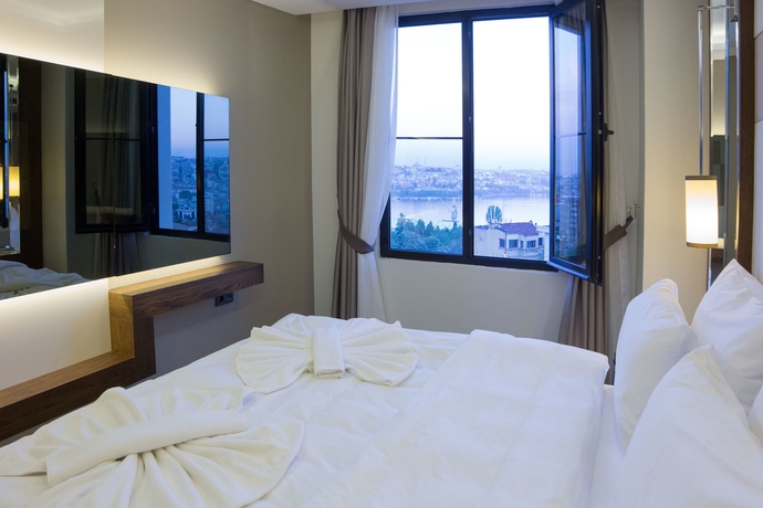 Imagen de la habitación del Hotel The Biancho Pera. Foto 11