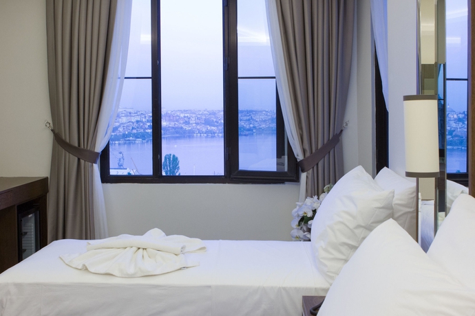 Imagen de la habitación del Hotel The Biancho Pera. Foto 12