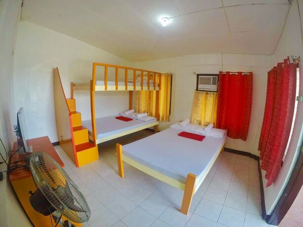 Imagen de la habitación del Hotel The Biggies Inn. Foto 10