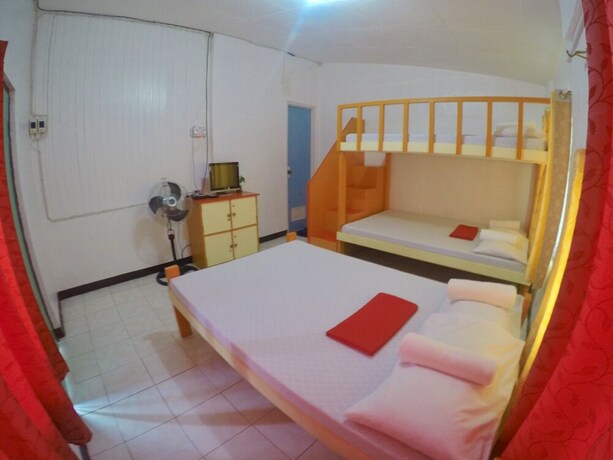 Imagen de la habitación del Hotel The Biggies Inn. Foto 13