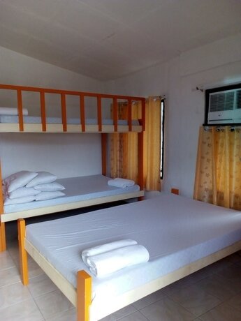 Imagen de la habitación del Hotel The Biggies Inn. Foto 15