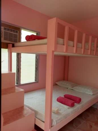 Imagen de la habitación del Hotel The Biggies Inn. Foto 16