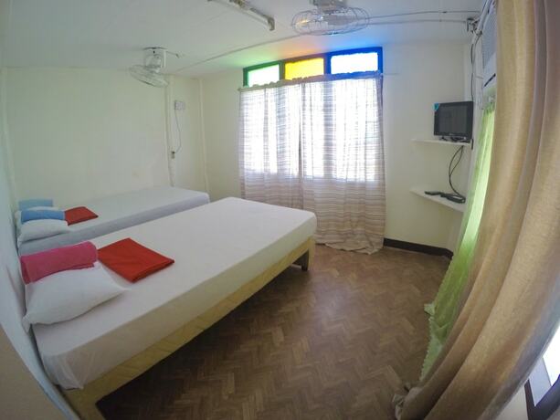 Imagen de la habitación del Hotel The Biggies Inn. Foto 17