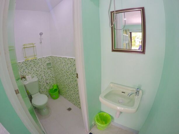 Imagen de la habitación del Hotel The Biggies Inn. Foto 19