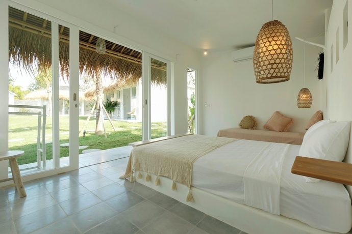 Imagen de la habitación del Hotel The Bingin Beach Villas Bungalow Resort. Foto 3