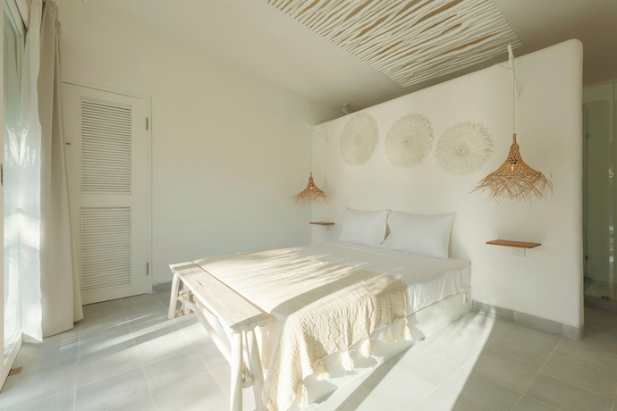 Imagen de la habitación del Hotel The Bingin Beach Villas Bungalow Resort. Foto 5