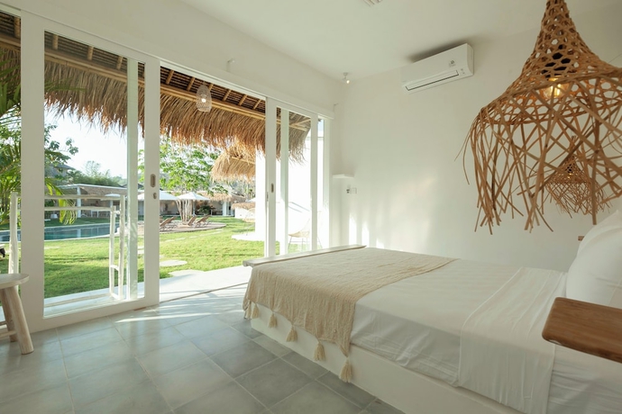 Imagen de la habitación del Hotel The Bingin Beach Villas Bungalow Resort. Foto 8