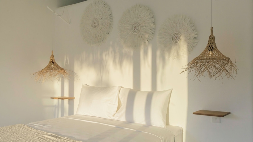 Imagen de la habitación del Hotel The Bingin Beach Villas Bungalow Resort. Foto 9