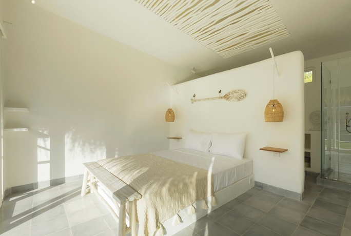 Imagen de la habitación del Hotel The Bingin Beach Villas Bungalow Resort. Foto 10