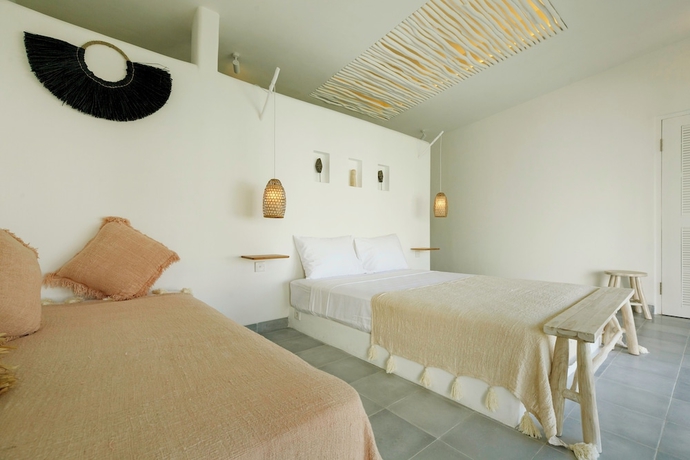 Imagen de la habitación del Hotel The Bingin Beach Villas Bungalow Resort. Foto 12