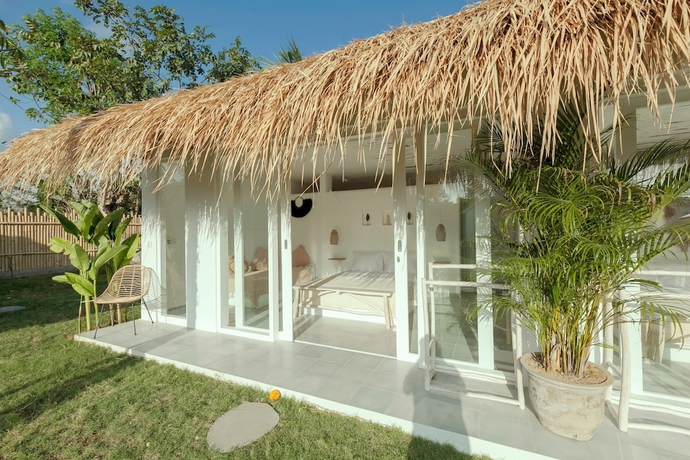 Imagen de la habitación del Hotel The Bingin Beach Villas Bungalow Resort. Foto 13