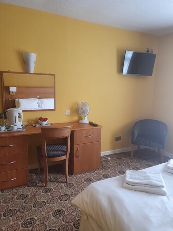 Imagen de la habitación del Hotel The Birley Arms. Foto 15