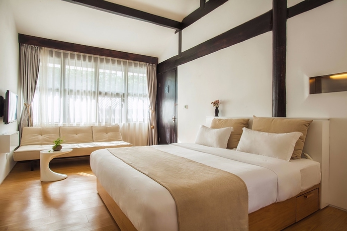 Imagen de la habitación del Hotel The Bivou Lijiang. Foto 6