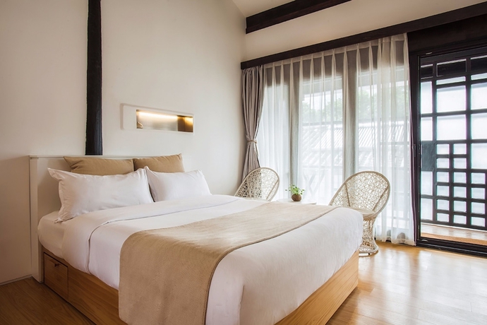 Imagen de la habitación del Hotel The Bivou Lijiang. Foto 8