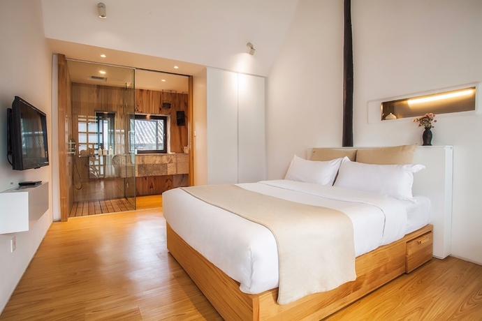 Imagen de la habitación del Hotel The Bivou Lijiang. Foto 9