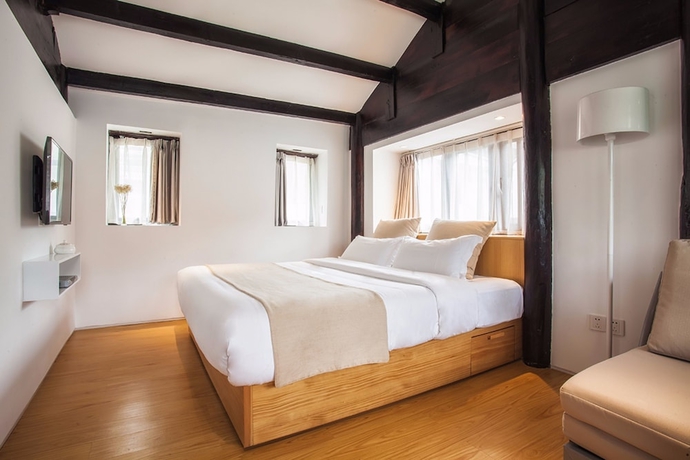 Imagen de la habitación del Hotel The Bivou Lijiang. Foto 10