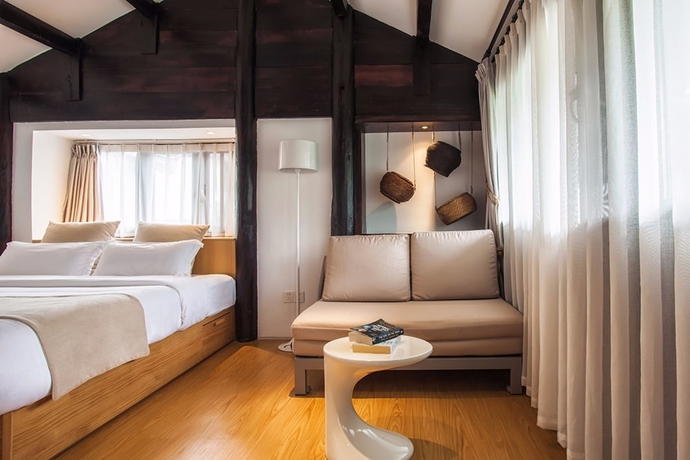Imagen de la habitación del Hotel The Bivou Lijiang. Foto 11
