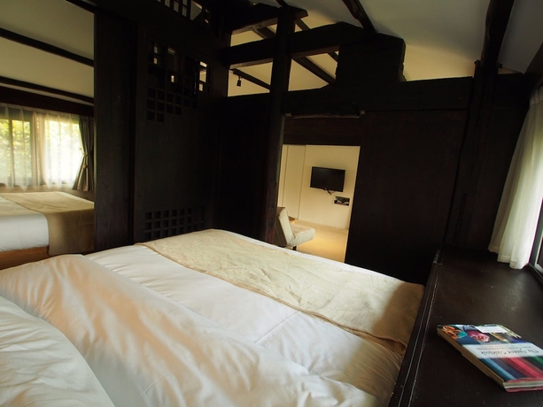 Imagen de la habitación del Hotel The Bivou Lijiang. Foto 16