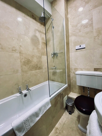 Imagen de la habitación del Hotel The Black Hole. Foto 13