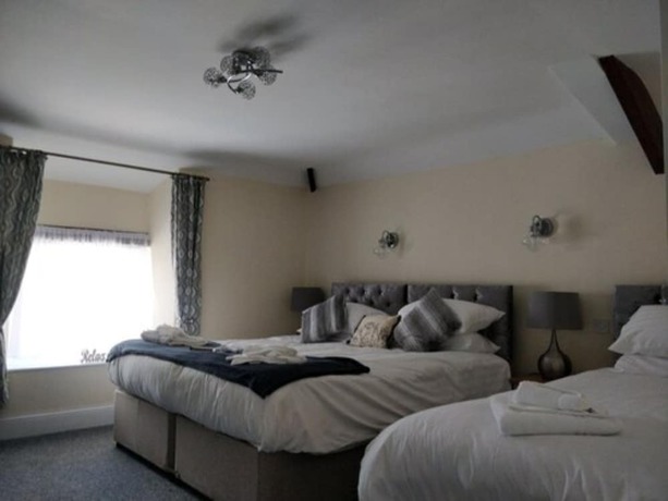 Imagen de la habitación del Hotel The Black Lion Royal. Foto 7