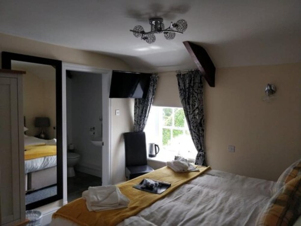 Imagen de la habitación del Hotel The Black Lion Royal. Foto 8