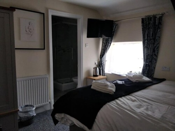 Imagen de la habitación del Hotel The Black Lion Royal. Foto 10