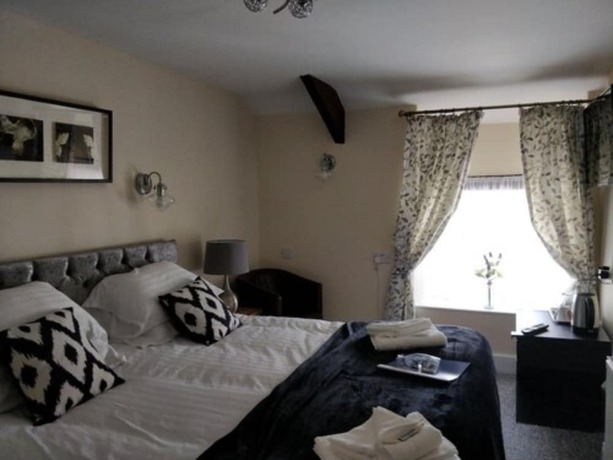 Imagen de la habitación del Hotel The Black Lion Royal. Foto 12