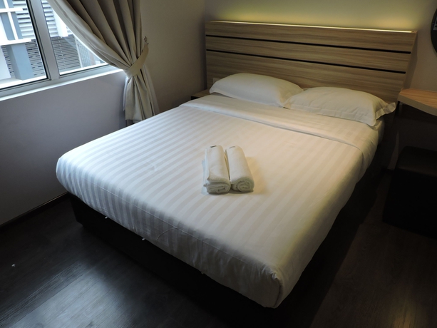 Imagen de la habitación del Hotel The Blanket, Perai. Foto 9
