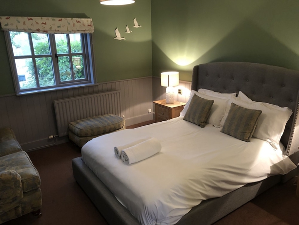 Imagen de la habitación del Hotel The Blazing Donkey. Foto 7